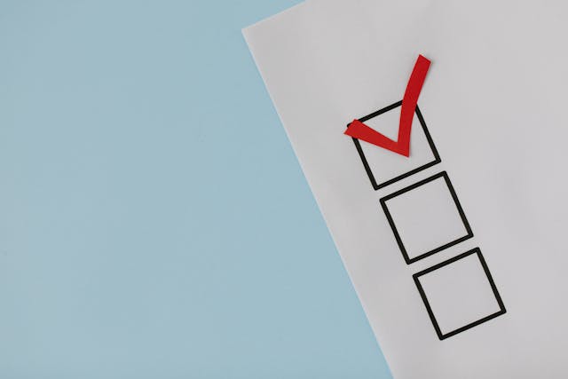 Checklist boxes with one red check mark