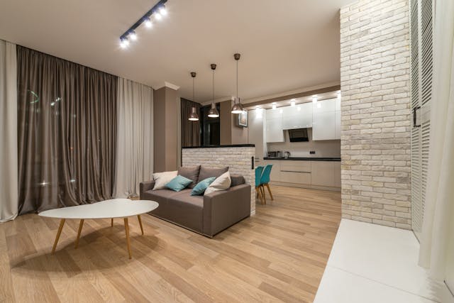 A furnished living room and kitchen