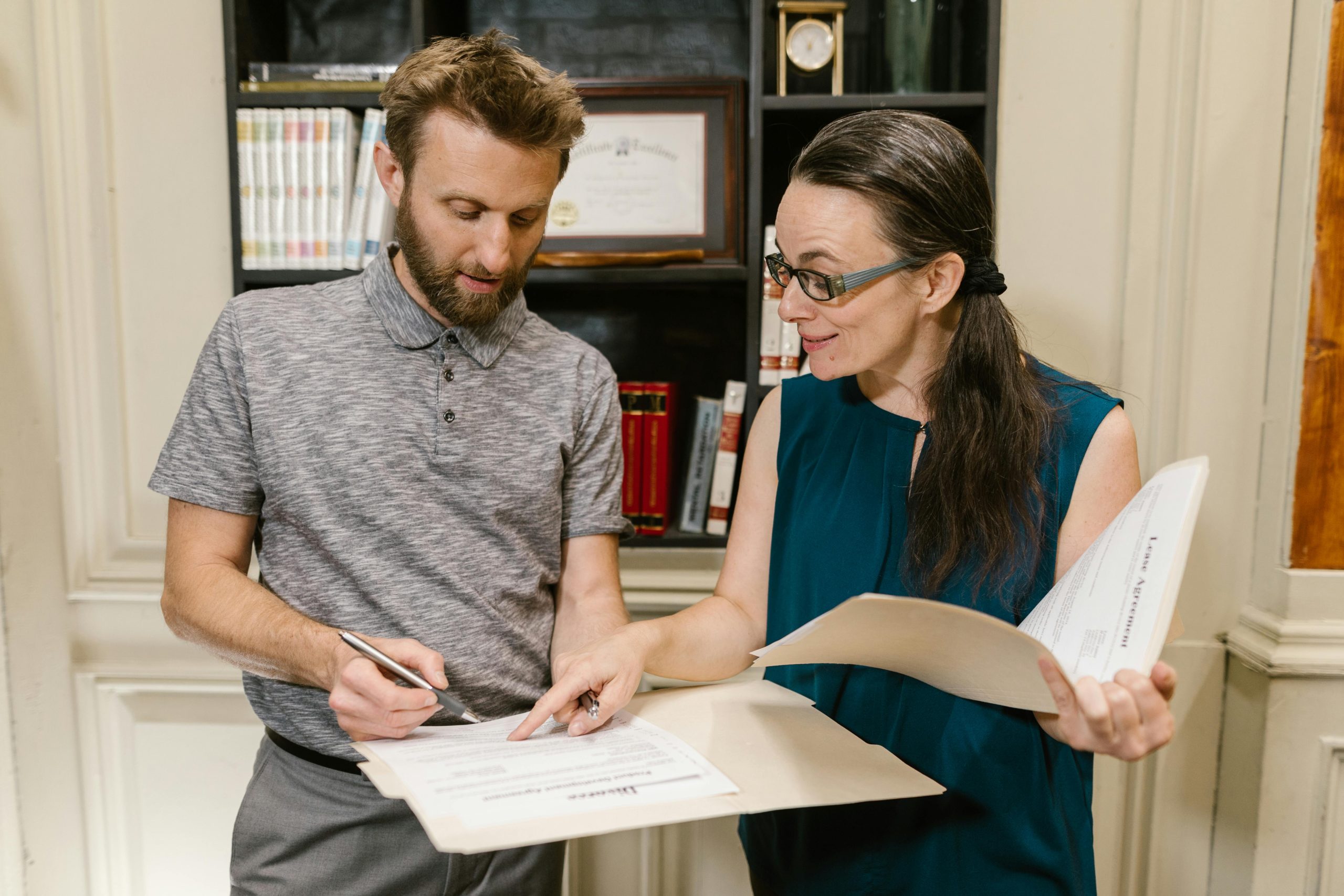women showing a man the agreement
