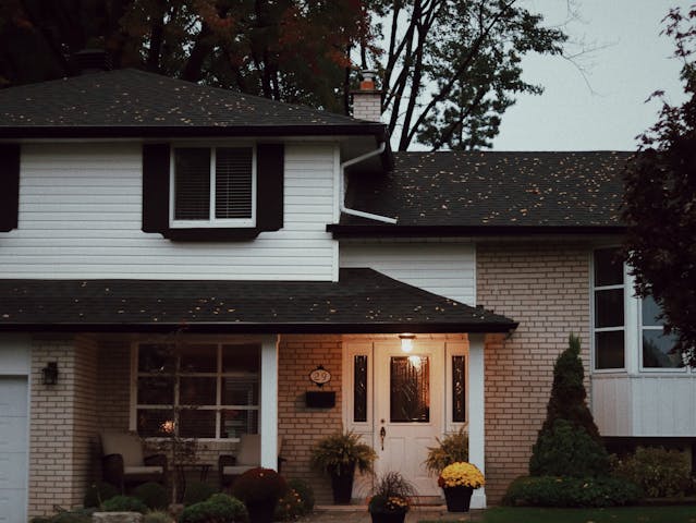 The exterior of the front of a home with a porch